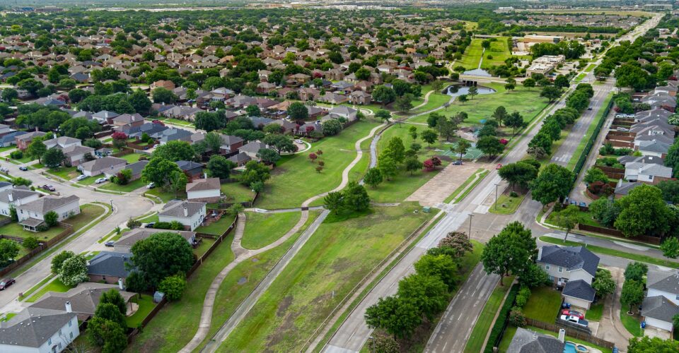 Cottonwood Creek Trail aerial of the long, narrow trail amongst the landscape in between the neighborhoods