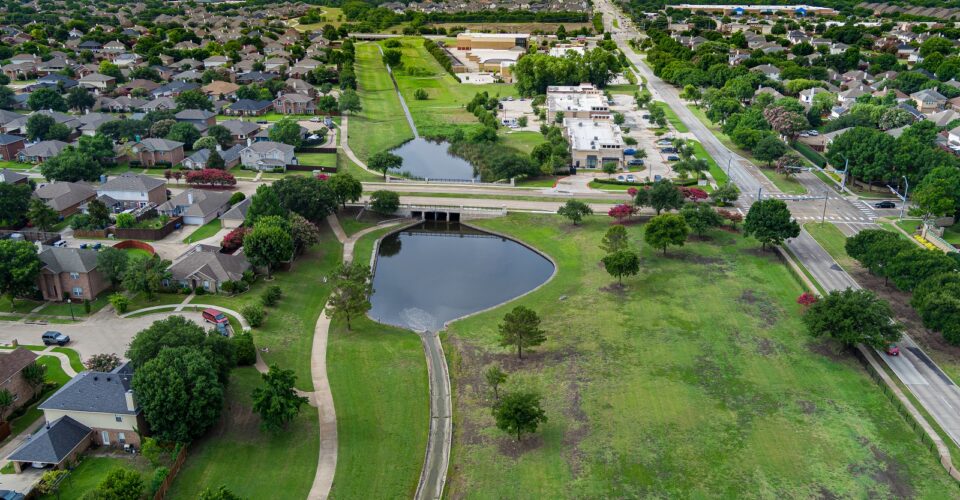 Cottonwood Creek Trail aerial of the long, narrow trail amongst the landscape in between the neighborhoods