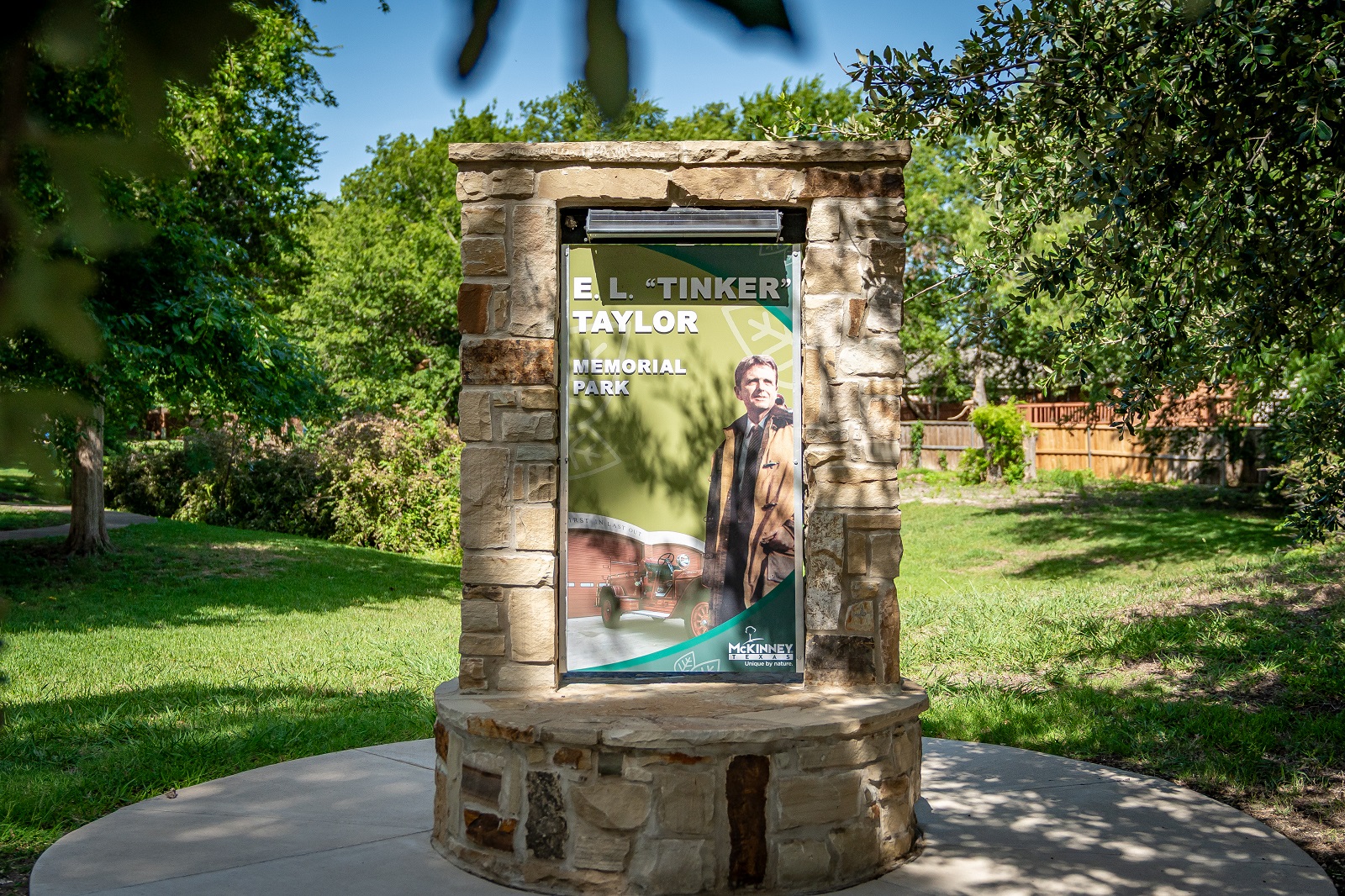 E.L. Tinker Taylor memorial park monument sign depicting the E.L. Tinker Taylor