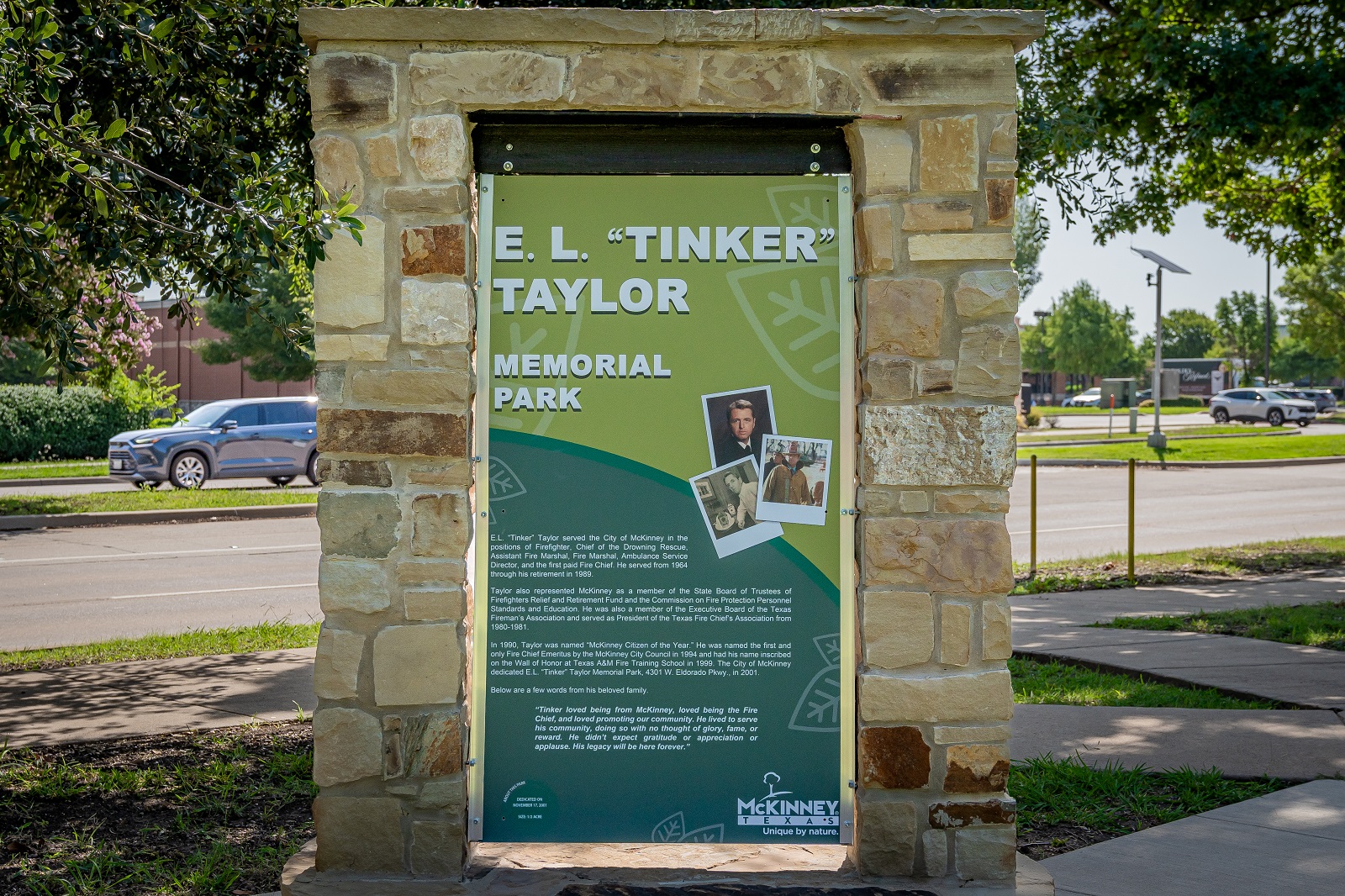 E.L. Tinker Taylor memorial park monument sign depicting the E.L. Tinker Taylor