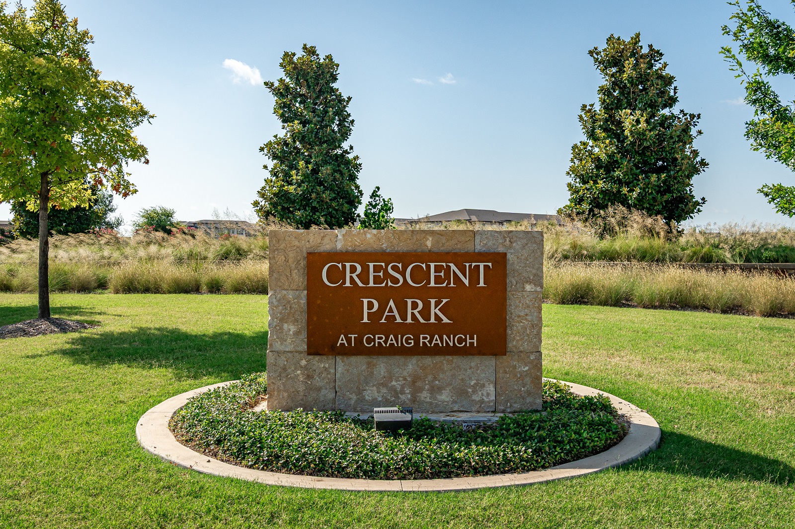 crescent park with beautiful stone monument sign